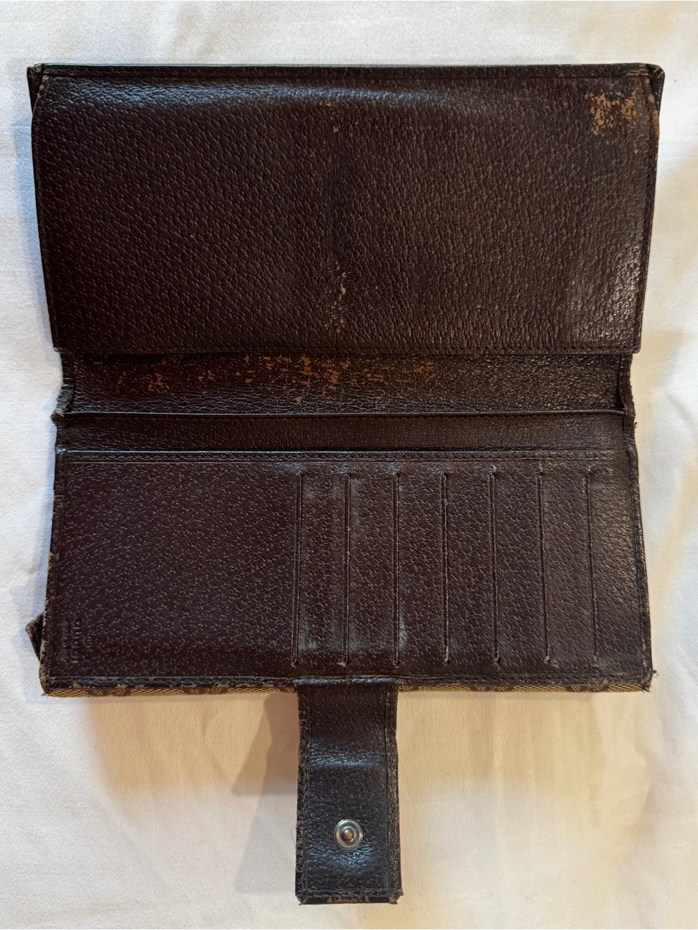 Authentic pre Loved Gucci Brown Monogram Continental Wallet.